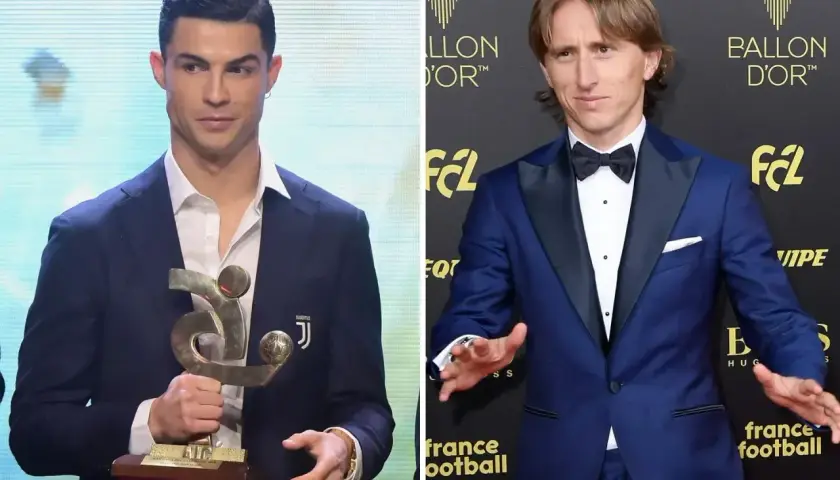 Cristiano Ronaldo z trofeum, obok Luka Modrić, który zdobył Złotą Piłkę.